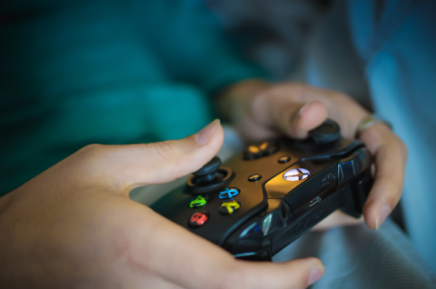 hands holding a video game controller