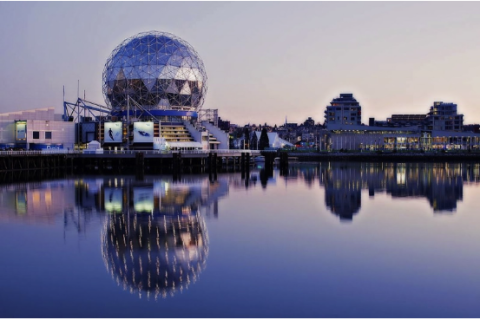 Science World in Vancouver overlooking False Creek on a clear, calm day
