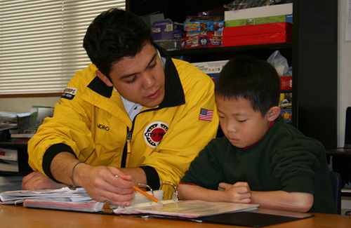 Tutor helping student